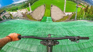 DOWNHILL MTB HILLBOMB ON SKI JUMP