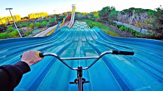 SNEAKING INTO WATERPARK TO RIDE BMX!