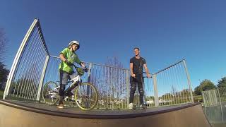 8 year old backflips bmx race bike to wood in...