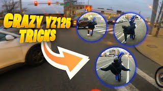 CRAZY YZ125 WHEELIES IN TRAFFIC!! *MOST SLEPT ON*