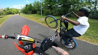 CRF70 VS MOTOR BIKE!! *WHEEL!E BATTLE*