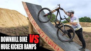 DOWNHILL BIKE VS HUGE KICKER RAMPS!