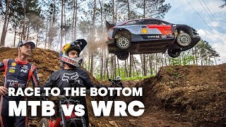 Mountain Biker Races WRC Driver I Andreu...