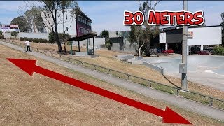 SCOOTER RIDER GRINDS THE LONGEST RAIL EVER!