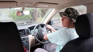 14 YEAR OLD DRIVING A CAR..