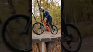 Sending my wife's tiny trail bike off this big...