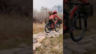 She loves plowing through rocks with her bike...