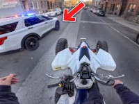 COP WANTED ME TO PULL OVER!! *LTZ400 WHEELIES*
