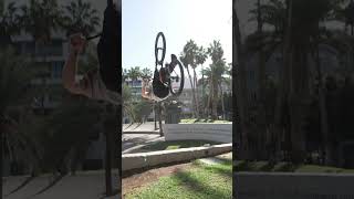 HUGE MOUNTAIN BIKE BACKFLIP IN THE STREETS!...