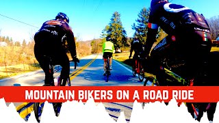 Mountain Bikers on a road ride