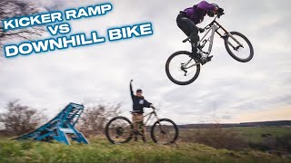RIDING MY NEW BIG KICKER RAMP ON THE DOWNHILL...