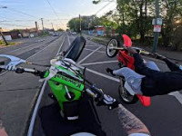 KX100 VS CR85 WHEELIE BATTLE!