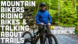 Mountain Bikers Riding Bikes Talking About...
