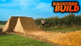 WE BUILT THE BIGGEST BACKYARD DIRT JUMP FOR...
