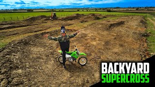 BUILDING A HUGE PIT BIKE SUPERCROSS TRACK IN...