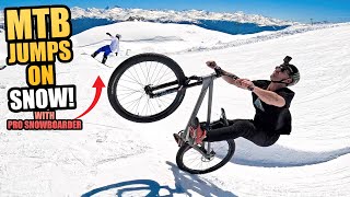 RIDING MTB SLOPESTYLE JUMPS MADE OF SNOW IS TO...
