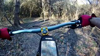 MTB TEXAS BIKE RIDER RIDING ON THE MUDDY...
