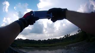 RIDING MOUNTAIN BIKE IN THE PARK ON A NEW...