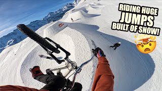 RIDING HUGE SLOPESTYLE JUMPS BUILT OF SNOW IS...