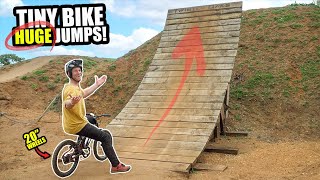 RIDING A TINY MOUNTAIN BIKE ON HUGE JUMPS -...