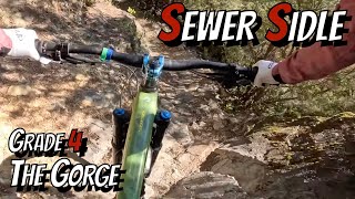 Sewer Sidle over rocks and trail cornflakes