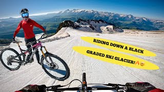RIDING MY BIKE DOWN A BLACK GRADED SKI PISTE!!...
