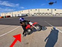 TEACHING KID HOW TO WHEELIE HIS DIRTBIKE!