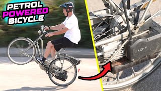 THIS WEIRD BIKE HAS A BUILT IN PETROL ENGINE -...
