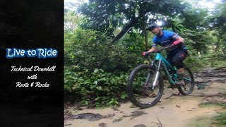 Riding rooty and rocky technical downhill @...