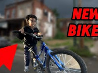 SURPRISING KID IN THE HOOD WITH A NEW BIKE!