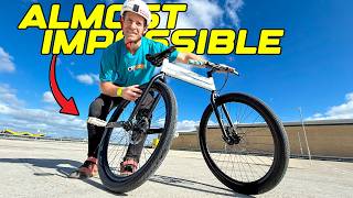 THE WOBBLE BIKE HAS TWO HEAD TUBES AND IS...