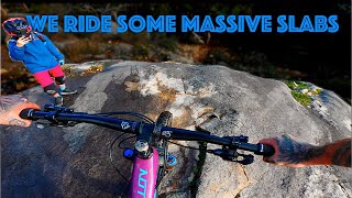 Mountain biking down massive rock slabs....