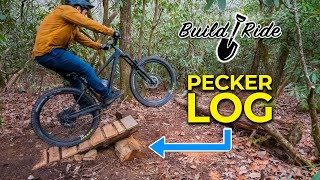 Building a “pecker log' jump and a new berm!