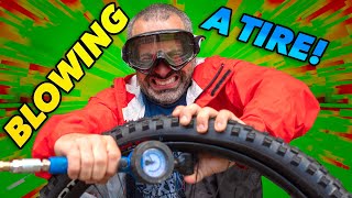 We blew it! Inflating a tubeless bike tire...