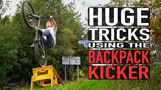 HUGE TRICKS USING THE BACKPACK KICKER// URBAN...