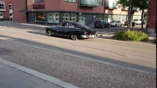 Black car driving away