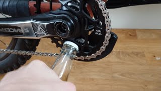 Absolute Black 34T Oval Chain Ring as a bottle...