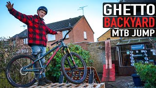BUILDING & RIDING A GHETTO BACKYARD MTB JUMP!!