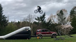 JUMPING A HUGE GAP OVER MY TRUCK WITH MY DD...