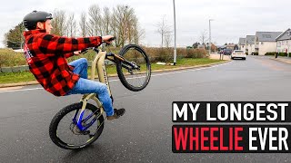 MY LONGEST WHEELIE EVER!!