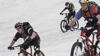 Downhill MTB training through snow, mud, and rocks