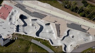 BMX & MTB riding massive concrete skatepark