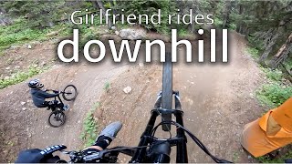 My girlfriend rides downhill mountainbiking in...