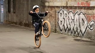 TEACHING A 7 YEAR OLD HOW TO WHEELIE A BMX!!