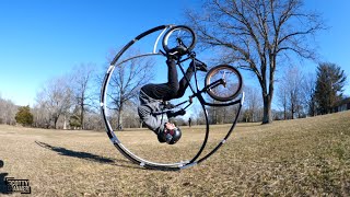 Roller Coaster Bike Rolls Down A Hill As Many...