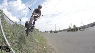 RIDING A FENCE QUARTER PIPE!