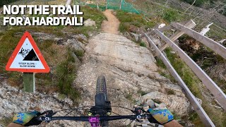 RIDING A HARDTAIL DOWN THE HARDEST TRAIL AT...