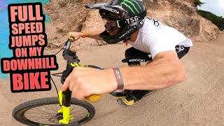 RIDING HUGE FULL SPEED JUMPS ON MY DOWNHILL...