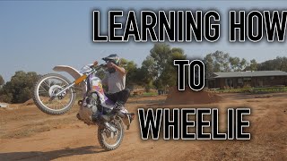 Trying to Wheelie My Motorbike