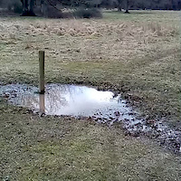 riding through a deep puddle
